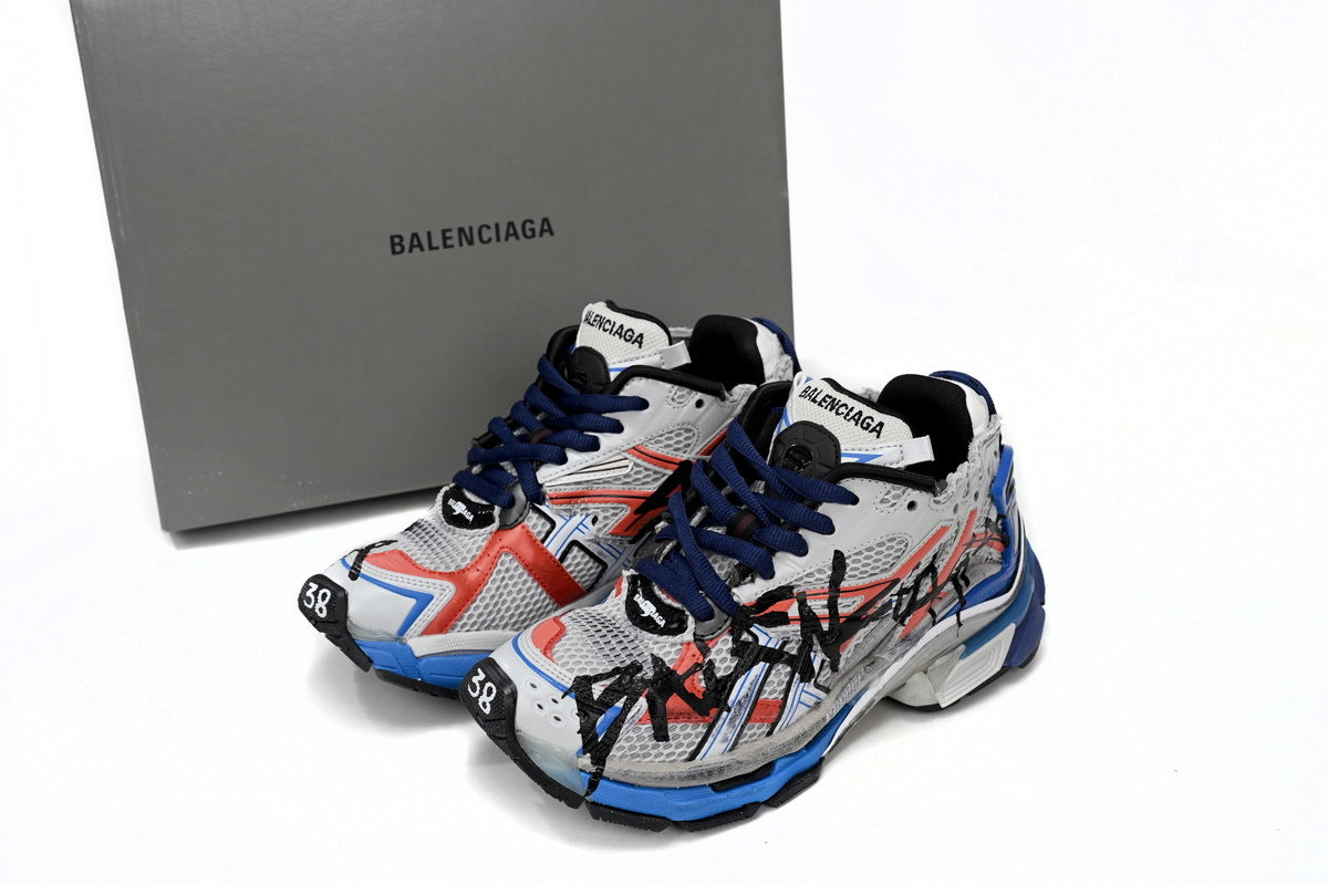 Balenciaga men's shoes Track Runner Sneaker ¨C Distressed Low-Top  balenciaga runners  Red, white, and blue